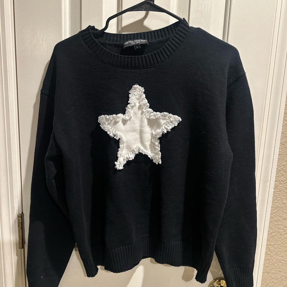 Central Park West Black Crewneck Sweater with White Frayed Star
